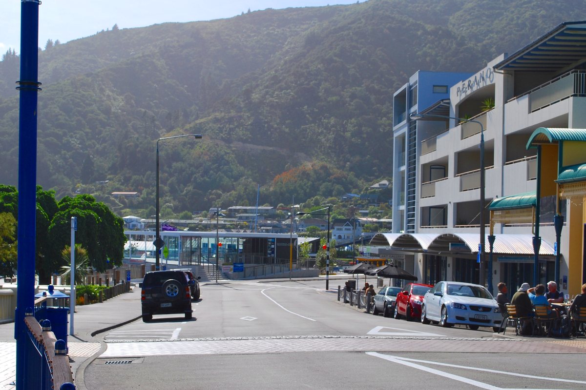 London Quay, Picton's waterfront street with outdoor cafe tables close to the ferry terminal